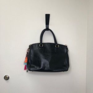 A Kendall Conrad Purse is great condition.